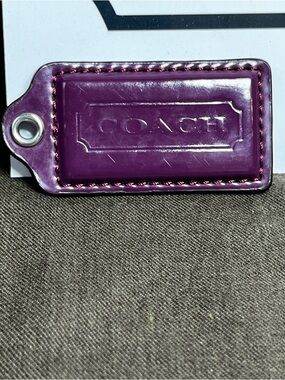 Coach Patten Leather 2.75” Hang Tag in Eggplant